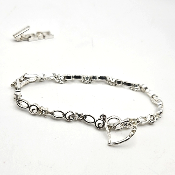 Jewelry - 🔸️RESERVED🔸️ AVON Silver Tone Rhinestone Heart Charm Bracelet with Extension